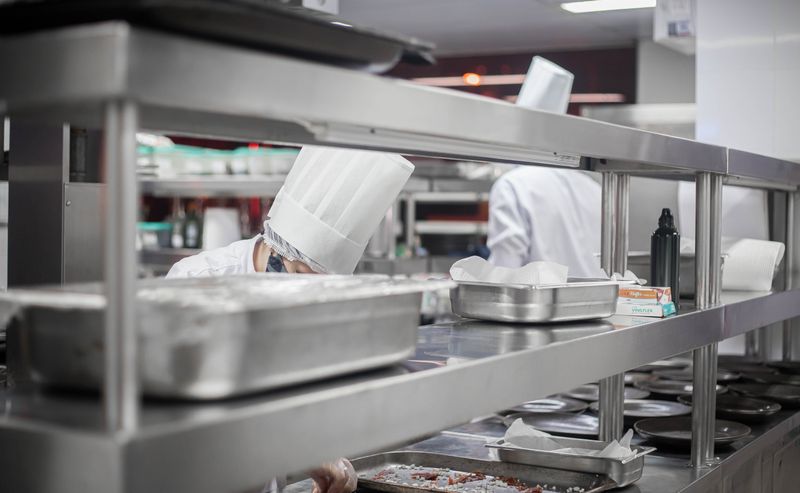 Aisha Brown, Line Cook at East coast wings